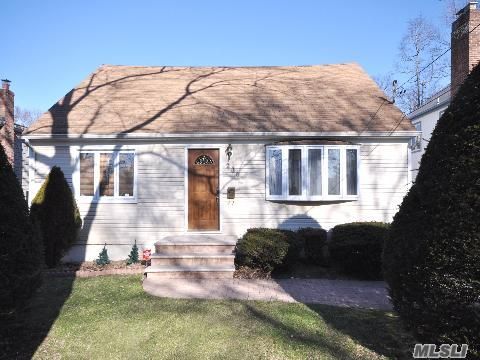 Beautifully Renovated Cape Located Mid-Block Has Been Totally Renovated!New Bathrooms With Earth Tone Tile & Neutral Decor,Den Extension Off Of Kitchen,Finished Basement,New Windows,New Front Door,New Walkway-Much Larger Than It Appears! 