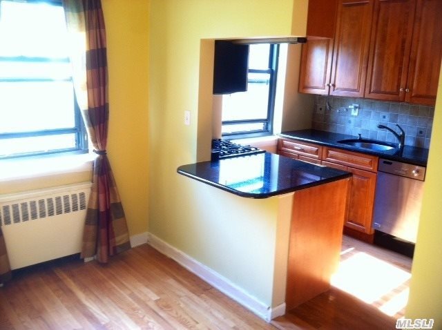 Modernized Kitchen,  Granite Countertops,  Plenty Of Storage Cabinets,  Stainless Appliances & New Dishwasher. Completely Gutted Bathroom. Re-Sanded & Finished Hardwood Floors. Renovated Custom Closet In Bedroom. Great Natural Lighting W/ Beautiful Sunset Views. Laundry & Personal 5 X10 Storage Space In Basement. Close To Lirr & Bell Blvd. Shops.