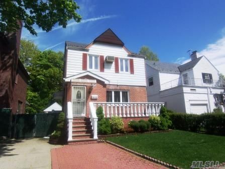 Updated Home With New Windows, Wood Floors, Pointed Brick. Great Backyard. 