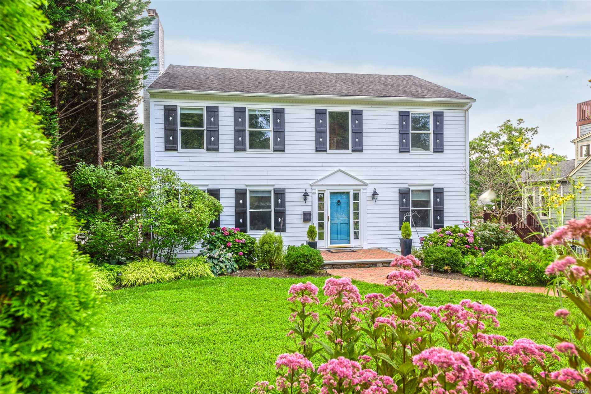 Embracing The Heritage Of A Center Hall Colonial Yet With A Progressive Sensibility, The Home&rsquo;s Rooms Naturally Adapt To A Less Formal Lifestyle. Lower Level Opens To Expansive Lawn And Terrace. Near Town, Train & Schools. Beach And Mooring With Association Membership & Dues.