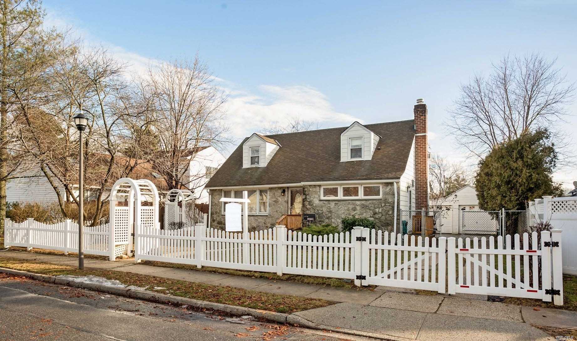 This Expanded & Rear Dormer 3 Bedroom, 2 Bath Cape Includes A Formal Living & Dinning Room With Hard Wood Floors. Natural Light Floods The Sunroom/Den Which Features Extra Thick Insulation, Heat & Ac, Sliders To The Yard & Hot Tub. Updated Kitchen, Baths, Electric & Boiler.