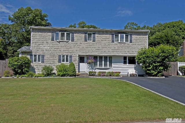 Large Expanded Split Colonial,  Eik,  Lr,  Fdr,  Den,  5 Bedrooms,  2.5 Baths,  Screen Sun Porch,  Large Fenced Parklike Property. Bay Shore Schools. Taxes W/Star $11, 255.65