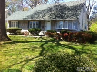 Charming Expanded 4 Bedroom Cape In Beautiful Massapequa Park Village Features A Formal Dining Room,  Den With Sliders To Backyard. Partially Finished Basement Includes Utility Room And Laundry Area. Nice Curb Appeal,  Close To Shopping And Lirr. Taxes Dont Include Star Savings Of $1198.