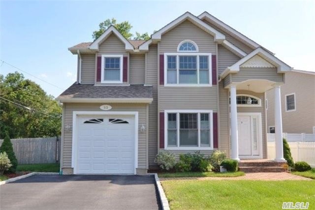 Spectacular 2011 Construction! Light & Bright Colonial Located In The Heart Of Syosset. Large Entertaining Rooms, Oak Flooring & Crown Molding Throughout,  Family Room With Gas Fp, Custom Eik With Gas Cooking, Large Bedrooms, Master Suite With Italian Tiled Bath W/Jacuzzi Tub, Full Basement, In Ground Sprinklers,  Full Attic, & Alarm.Truly A Gem!! Will Not Last!