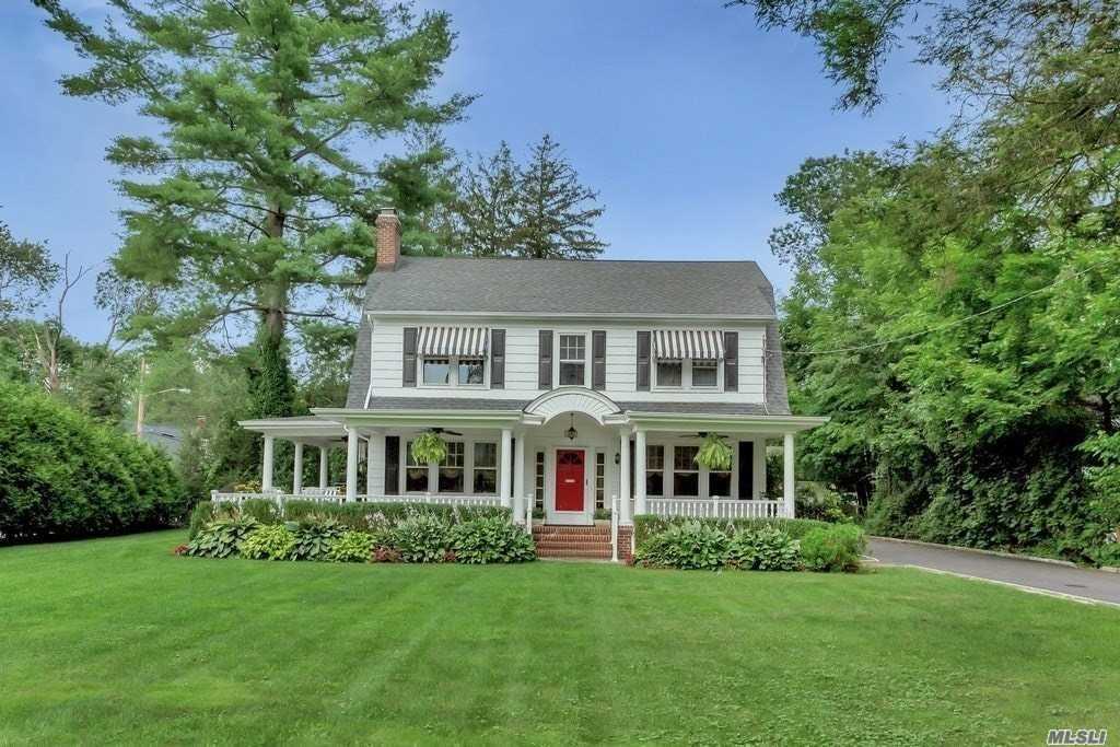 Prime Location; North Syosset Center Hall Colonial On 1/2 Acre. Wrap Around Porch, Magnificent Landscaping, 2 Master Suites. Formal Living Room, Dining Room, & Expansive Great Room. 1 Wood, 1 Gas Fireplaces. Kitchen Leading To Gr & Dr. Master W/ Marble Bathroom W/ Steam Shower, Air Tub & Balcony Overlooking Backyard Finished Basement W/ Storage, Laundry & Guest Room/Playroom. Craftsman Moldings Throughout The House. A Must Have For Cooks And Entertainers. 1 Mile To Lirr.