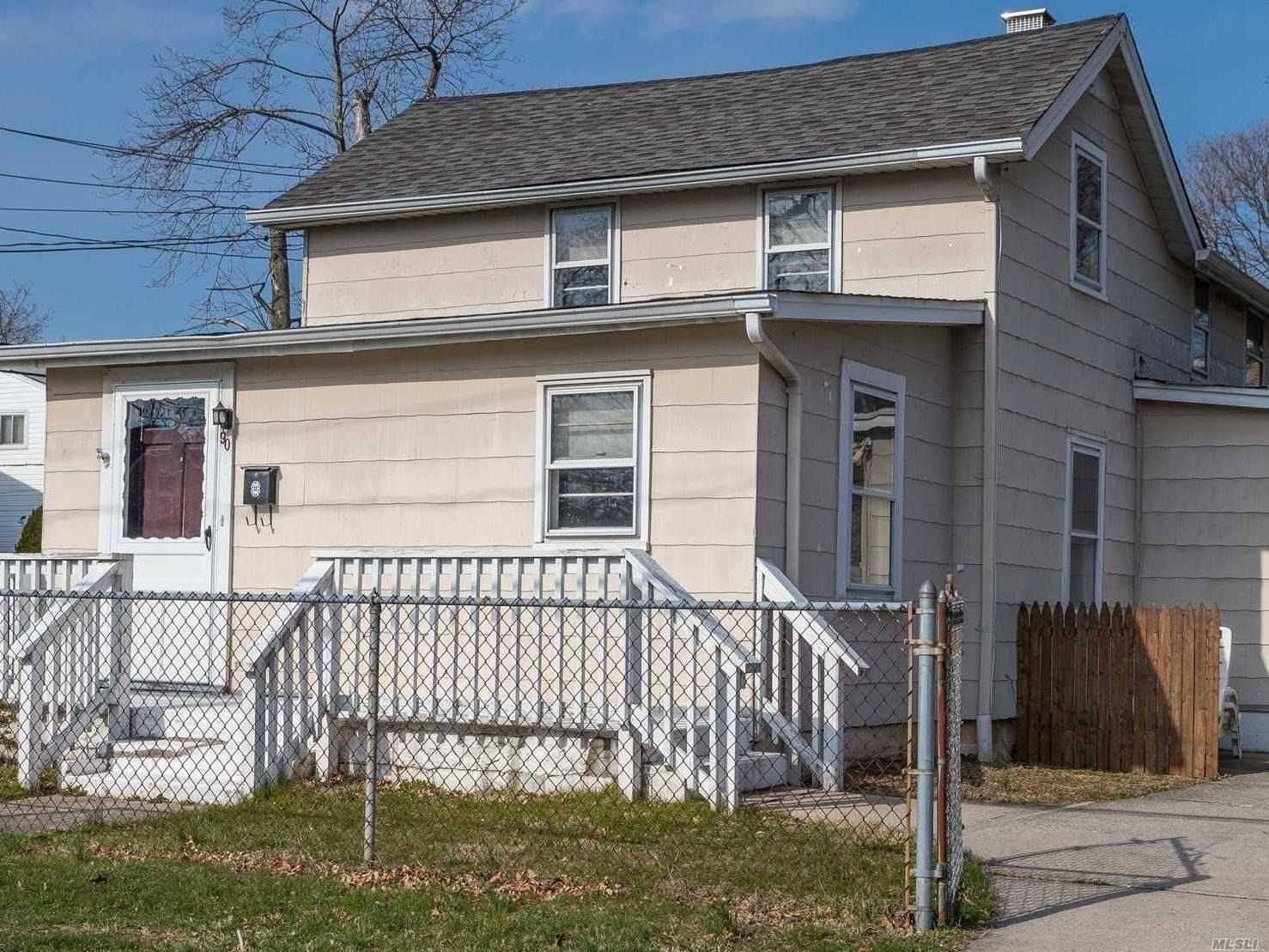 Sunny Colonial On Tree Line Street. Cozy Living Room, Beautiful Formal Dining Room, Great Eat In Kitchen, Full Basement For Storage And Utilities. Close To Shops And Transportation. Great School District. 35 Minutes To Brooklyn, 25 Minutes To Queens And 35 Minutes To Manhattan Via Lirr And More...