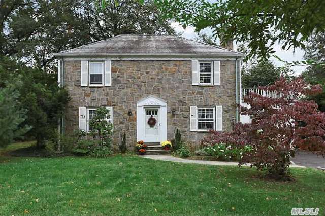 Stone Front Center Hall Colonial,  Located In The Village Of Plandome,  Convenient To The Train,  Across From  Private Park.  Hardwood Floors Throughout ,  Family Room With Vermont Casting Wood Burning Stove.  First Floor Has An Entrance Foyer,  Formal Dinning Room,  Eat-In-Kitchen Family Rm And A Large Living Room With Fireplace