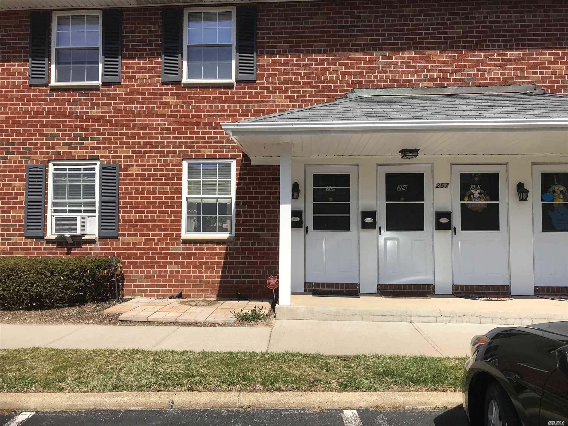 Absolutely lovely! Extra cabinets and counter space in this updated kitchen. Hardwood floors, updated bath, spacious rooms, washer/dryer in unit! Owner and Visitor Parking, mail delivered right to your door! Garage when available is extra charge. Taxes included in maintenance, also includes heat and hot water. Ground floor unit! Why rent when you can own!