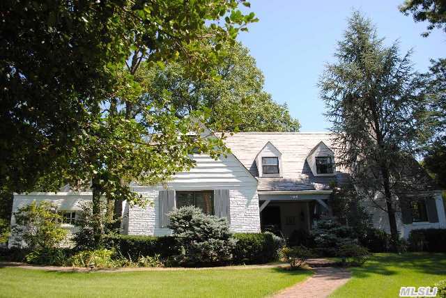 Great New Price Village Of Plandome Manor Charmer. Approximately 35 Mins Train Ride To Manhattan,  Sits This Lovely 4 Bedroom Tudor Style Home With Master Bedroom On The Main Floor,  Lots Of Updates And Park-Like Backyards. Close To Shopping And The Village Of Manhasset And Port Washington.