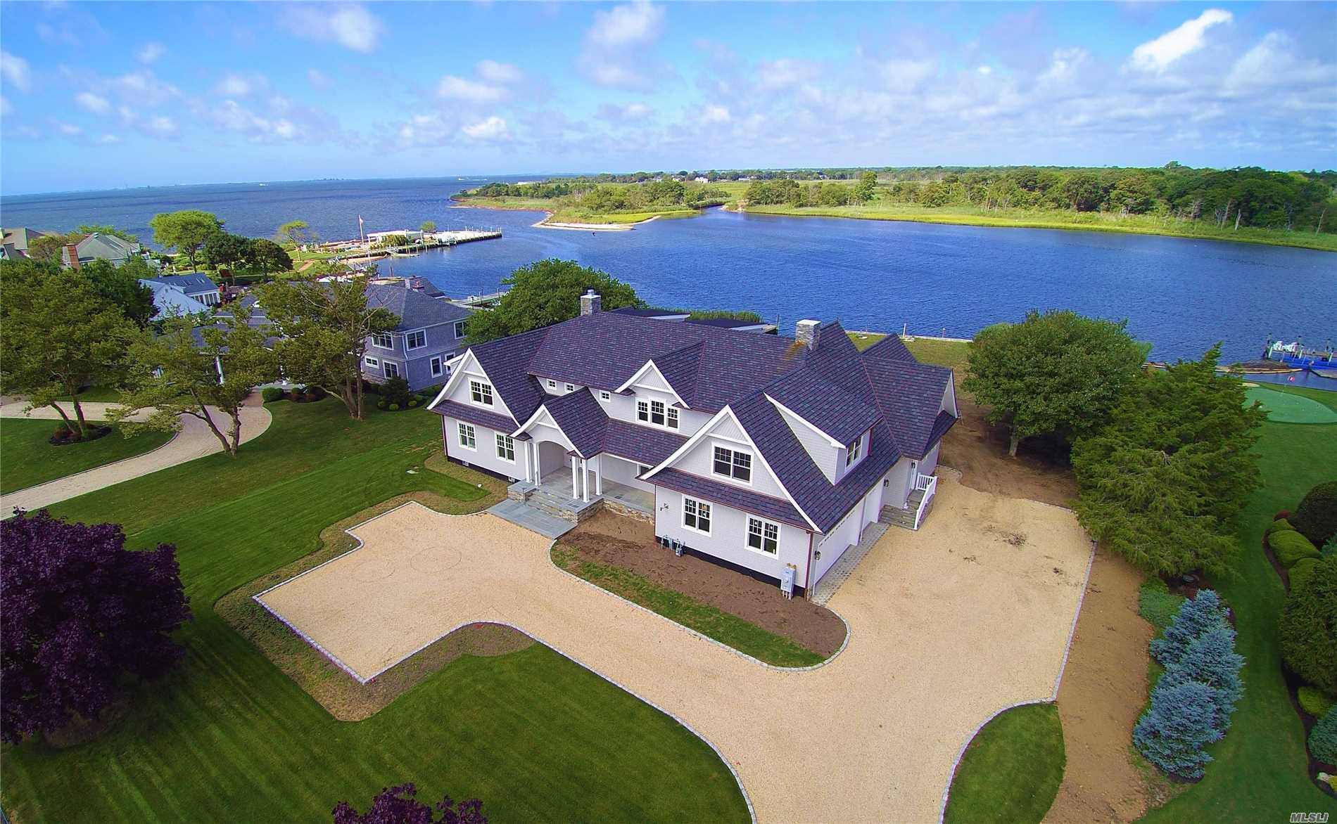 2018 Hampton's Style Cedar Colonial On Champlin Creek In The Moorings. This 4600-6100 Sqft Mansion Is One Of Eight Properties With Protected Water For Your Yacht And Bay Views. 1 Acre Of Serine Privacy And Stunning Sunset Views Of The Nature Preserve Across The Way. Hi End Build All The Bell And Whistles Including 5/4 Kitchen Cabinetry And Amazing Mill Work Thru-Out.3 Car Gar, Full Basement. Elevation Elevation Elevation! Location Location Location!