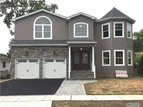 *Photos Shown Are Of Exact Model Home Built Previously By Same Quality Builder. Customize NOW! Approx 3100 Int SF Designed To Perfection & Being Built W/Utmost Quality Of Craftsmanship By Bldr Of 30+ Yrs/400+ Homes. Large 4 Bdrm, 2.5 Bath Gorgeous Colonial W/2-Car Gar, Front Paver Walkway To Bluestone Stoop/Porch, Eat-In-Kitchen W/Top-Of-Line SS Appliances, & Full Bsmt. Pristine Bellmore Loc Close To Schools/Lirr/Dining/Shops/Etc. No Amenities Spared. Top Notch Energy-Efficient New Construction!