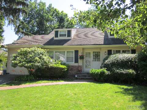 Spacious 5/6 Br & 2 Bath Colonial.Walk To Town/Rr.Lrg Lr,Fdr,Eik W/Bkfst Bar,Granite Counters,Wood Cabinets.Fam Rm.Br,New Bath W/Jacuzzi Tub On 1st Fl.4 Brs/Full Bath On 2nd Fl.Lower Level W/Office,Laundry Rm,Playrm,Huge Storage,Att Gar.