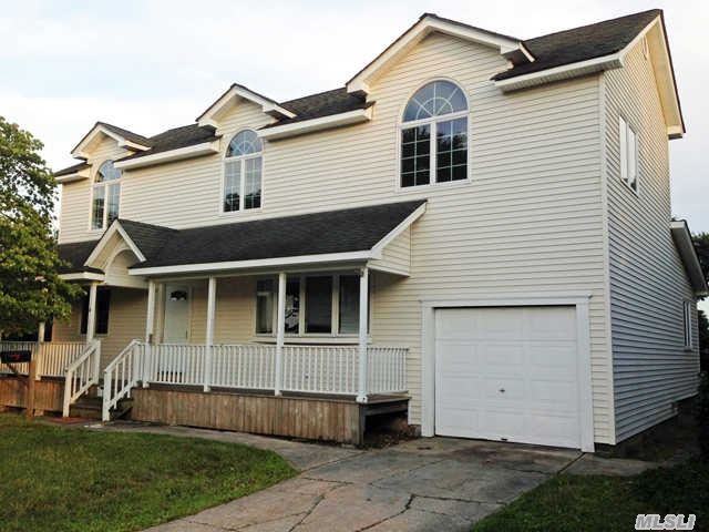 Step Into This Spacious Colonial Home Perfectly Placed In The Heart Of Farmingdale. Featuring 5 Bedrooms,  2 Baths,  Cathedral Ceiling,  Hardwood Floors,  And A Formal Dining Room. Ideal For Front Porch Lounging And Backyard Entertainment,  With Upstairs Extra Living Space,  You Have Room For So Much More. Make This Your New Home Sweet Home!