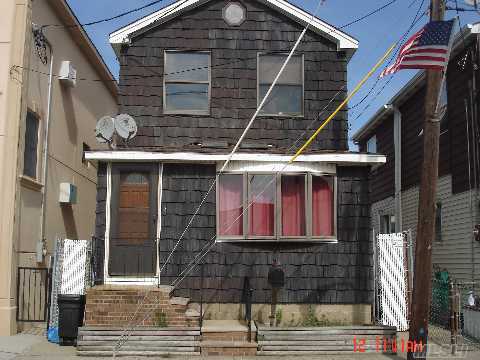What A Loacation In Broad Channel!!!  Manhattan Skyline In Your Backyard ....Second House From End Of Canal And Open Bay...Colonial Home, 3 Bedroom , Master Bedroom Has Vaulted Ceings With Terrace. Oversized Kitchen, Spacious Living Room W/Hardwood Floors.  House Is Very Sunny And Bright!!! 