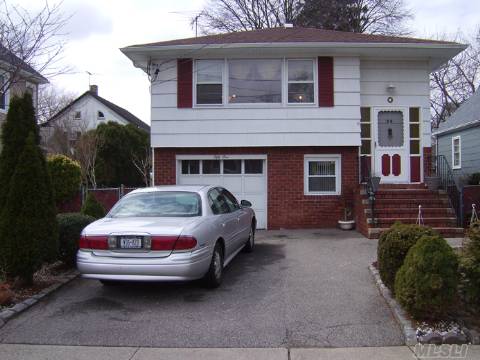 Fantastic And Lovely High Ranch! Beautiful Hardwood Floors, New Baths, Granite Eat In Kitchen, Central A/C, New Windows On First Floor, Clean, Bright, No Wallpaper, Perfect Location, Mid-Block, Quiet Street Near All.