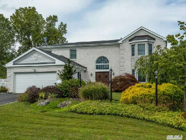 Exclusive Ponds Edge Of Muttontown Invites You To This Elegant Brick Colonial With Outstanding Curb Appeal. Built In '97,  6Brs,  4.5Bths,  Dramatic Open Floor Plan,  10'Ceilings,  Perfect M/D,  Unsurpassed. The Speciman Plantings Surrounding The 1/2 Acre Are Simply Breathtaking! While Sitting & Having Cocktails,  Is A Conversational Koi Pond. 1/2 Ball Court. Superior Location.