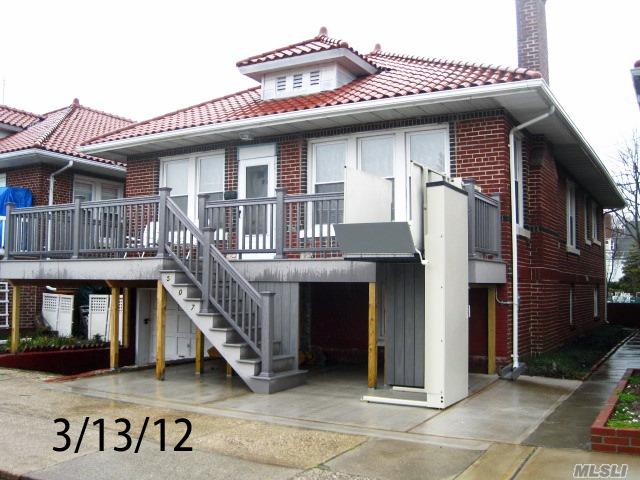 Original Brick Beach Bungalow Located In The Westholme Section. Needs Tlc