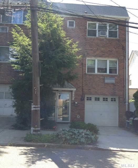 Fabulous Three Bedroom Semi-Attached End Unit On Highly Desireable And Centrally Located Site In Bayside.  New Kitchen With Granite Counter-Tops,  Wood Floors Throughout,  Newly Painted,  Hi Hats In Living Room And Dining Room,  Close To Shopping And The Long Island Railroad Station.