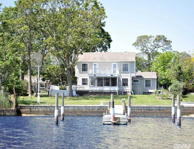 Beautiful Water Front Home In Beach And Boating Community! Check Out *Www.Hbpoa.Com* This Home Boasts An Open Floor Plan Great For Entertaining, Large Rooms And Views All Around!  Bring Your Boat And Water Toys Just Minutes From The Open Bay With A Gas Fireplace, Hard Wood Floors This Home Has Been Updated And Has It All!! Move Right In! Taxes W/Star $13,200!