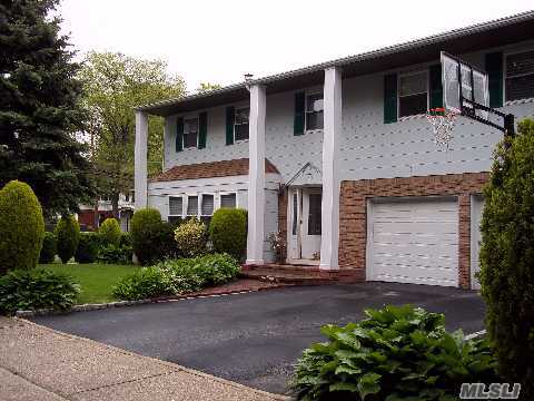 Well Maintained Colonial House In North Syosset, Built 1982, Hardwood Floors, New Bathrooms, Updated Kit, Large Bedrooms, Finished Basement, New Windows, Newer Roof,Cac, Nice Brick Patio For Summer Time, Taxes W/Star $14757.03