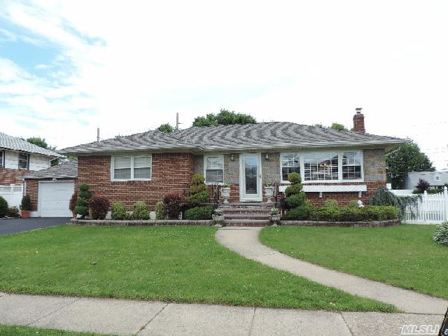 'Look No More'  Totally Updated Ranch W/ State Of The Art Kit(Granite & Stainless Appl),  Cer. Tiled Bth W/ Walk-In Shower & Whirlpool,  New Roof,  Gutters,  Wdws,  Boiler,  Pvc Fence,  Crown Moldings,  Widened Dvy,  Newer Stoop,  Upstairs Less Than 3 Yrs Young,  Great Fin. Bsmt Ideal For Entertaining W/ Wet Bar,  Pool Table, Ceramic Bth,  Much More.  Taxes Don't Reflect Star($1236.33).