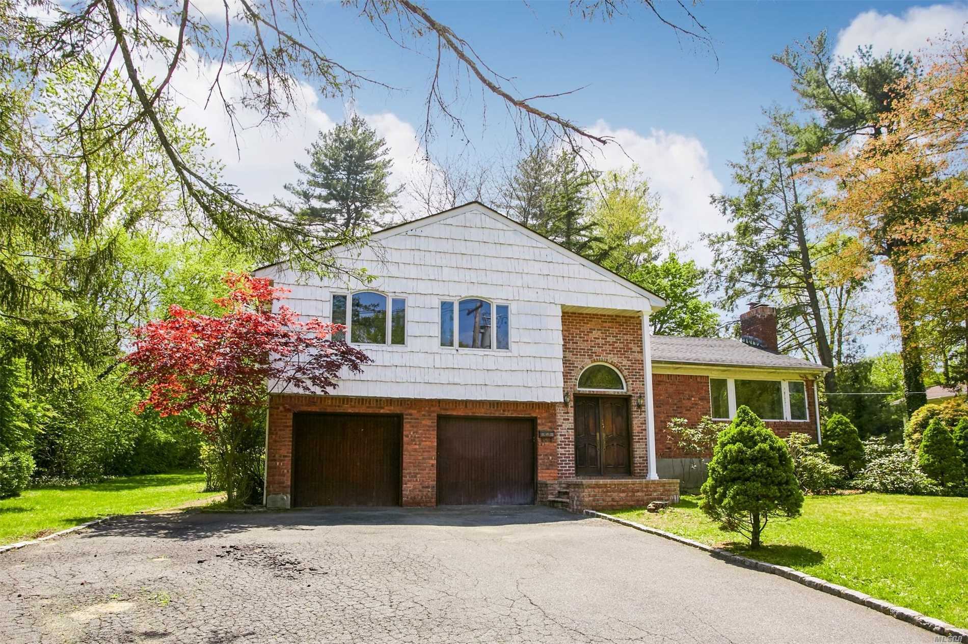 This beautiful home features newly finished gleaming wood floors throughout, new paint, beautiful formal entry way with marble tile. Finished basement with new floors. Fireplace with custom built mantle. Detailed molding throughout. Large back deck for entertaining. Part of the Great Neck District, Located near many places of worship, transportation, and access to Northern Blvd.