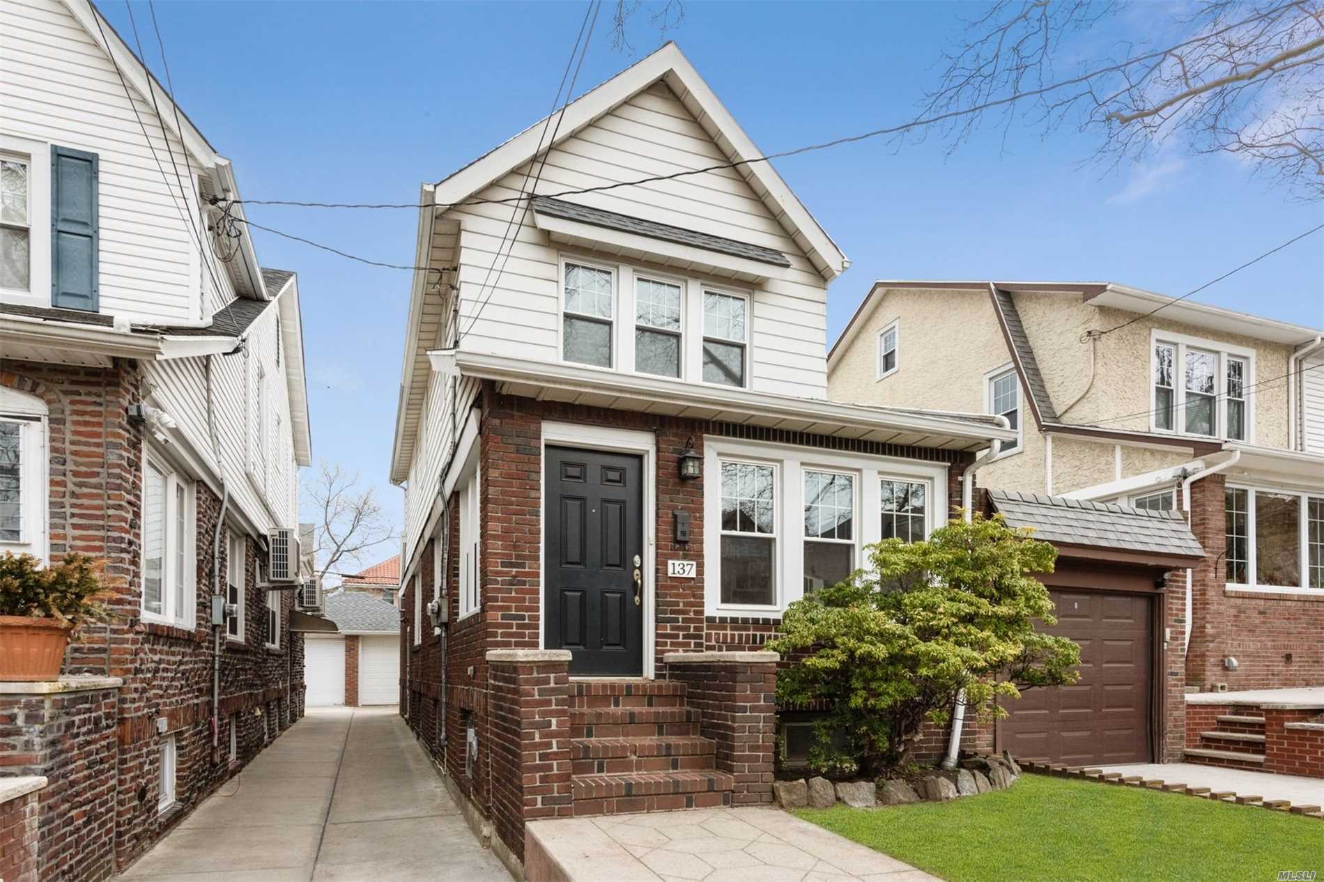 Beautiful Sun Filled, Renovated, Detached Colonial on Tree Lined Street in Desirable Section of Bay Ridge. Features Updated Eat In Kitchen, Updated Bathroom With Double Vanity, Original Wood Floors, Formal Dining Room, New Windows & Plumbing & Partially Finished Basement W. Side Entrance. Private Garage & 35 Ft Wide Backyard. Cycling & Jogging Along Shore Rd, Close to Shopping, Restaurants & Easy Options to Manhattan via Express Bus, Ferry, and Subway. Top Rated Public & Private Schools