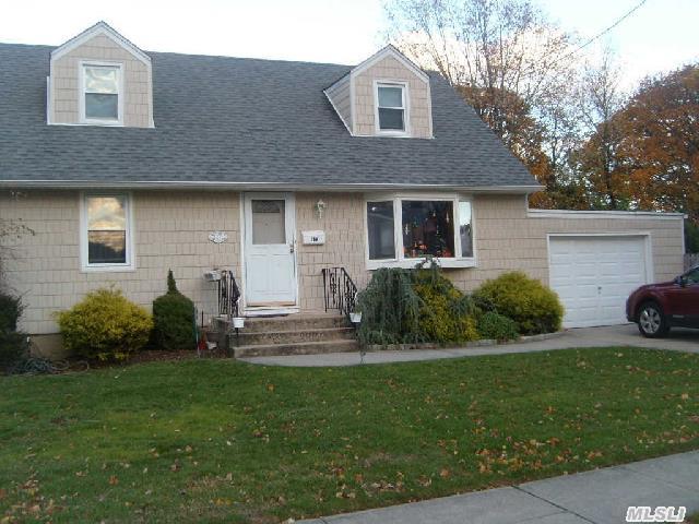 Large 4 Bedroom 1 Bath Cape-Wood Floors And Carpet--New Kitchen,  Newer-Boiler-Washer-Dryer-Hot Water Heater-Windows-Roof. Lg Master Bedroom On First Floor-All Large Bedrooms And Tons Of Storage. Fin Basement With Bar For Entertaining-Sep Utility Are With Tons Of Storage-Inground Sprinklers--Can Be Converted To Gas-Above Ground Oil Tank-Taxes Shown Before Star