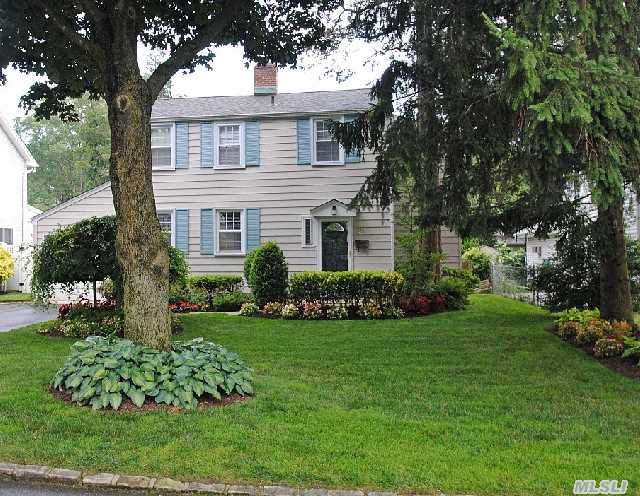 Totally Renovated 4 Bed,  2.5 Bath Colonial On Beautiful Tree Lined Street. Designer Kitchen & Baths,  All New Moldings,  Doors & Windows,  New Finished Basement,  Oak Flooring Thru Out,  Burglar Alarm,  Ig Sprinklers. Lovely Yard! Move Right In! East Williston S.D.!