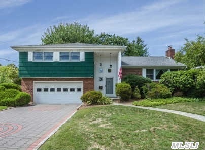 Fabulous Oppty! Large 3Br,  2.5 Bath Split In Prime Location In Flower Section Of North Syosset. New Paver Driveway,  New Roof,  New Electric,  New Oil Burner,  Updated Windows. Lr W/Fireplace,  Formal Dr,  Lge Eik,  Den,  Enclosed Back Porch,  Master Br W/Full Bath Plus 2 Brs & Family Bath. 2-Car Garage. Close Proximity To Lirr. Perfect For Nyc Commuter. Berry Hill Elementary.