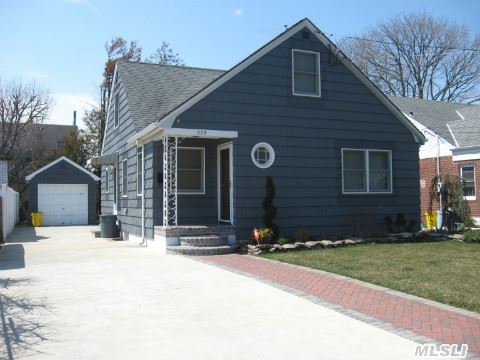 New Everything!!! New Kitchen W/Stainless Appliances & 42' Solid Wood Cabinetry. New Hardwood Flrs Throughout,  New Cac,  Hot Water Heater,  Roof,  Pavers & Driveway. New Windows & Doors. New Landscaping & Patio. New Sliding Door From Den To Backyard. All Plumbing & Wiring Redone. Den Can Be Converted To Third Br.