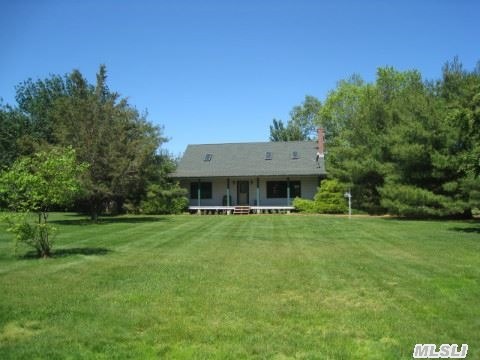 Very Private Property On 2 Acres! Log Cabin With 3 Bedrooms Near All In Southold. This Property Features A 3 Car Detached Garage As Well As A 32' X 52' Barn With Electric,  Perfect For Car Collectors, Contractors,  Home Based Businesses Among Others.A Great East End Getaway!