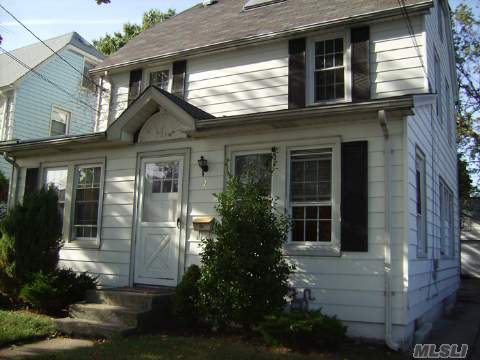 Legal Two Family Home In The Herricks School District. First Floor Features A Living Room, Eat In Kitchen, Two Bedrooms And A Full Bathroom. The Second Floor Features Two Bedrooms, Large Living Room, Eat In Kitchen, Full Bath, And Walkup Attic. The Basement Is Half Finished With Two Separate Gas Boilers. There Is A Two Car Garage. Convenient To All.