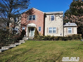 Classic Center Hall Colonial Located On 1/3+ Acre In Prestigious Baxter Estates. This Beautifully Maintained & Landscaped Home,Surrounded By Towering Oak Trees Has 4 Brs, An Office, Maid's Room, 3 1/2 Bths,2 Car Garage & Much More