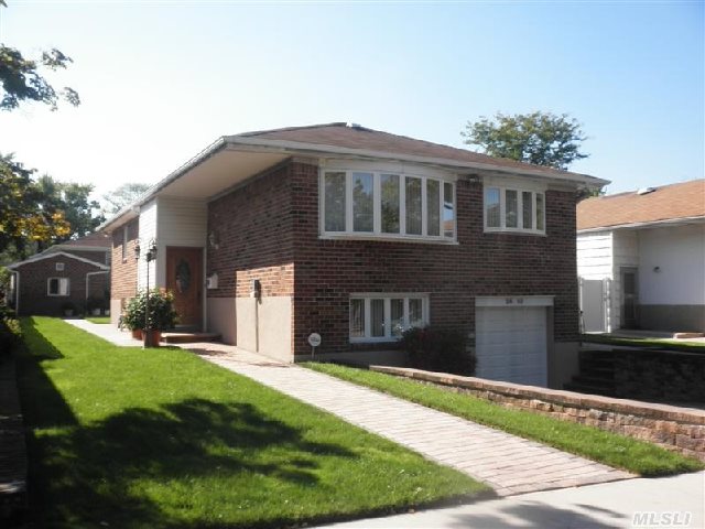 Amazing Custom Solid All Brick Detached Two Family ! This 2 Family House Has Been Fully Renovated From Top To Bottom Like New. Garden Like Backyard With Pavers Patio! Oversized 50X110 Property !