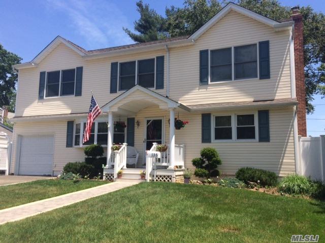 Expansive Colonial With Many Possibilities, First Floor 2 Bedrooms Could Be Master Suite, Hardwood Floors, Den With Fireplace, Living Room, Dining Room, Full Finished Basement, 4 Bedrooms Upstairs, Sitting/ Playroom Area, Located In A Great Neighborhood Close To All.
