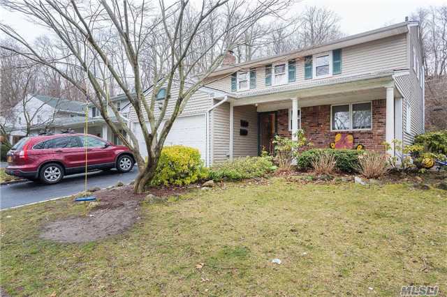 Beautiful Colonial With Large Rooms And Fireplace. Walk Out Sliding Doors Onto Patio In Private Backyard. Hardwood Floors Throughout. Master Bedroom With Master Bath Plus Walk In Closet. 3 Additional Bedrooms And Full Bath.