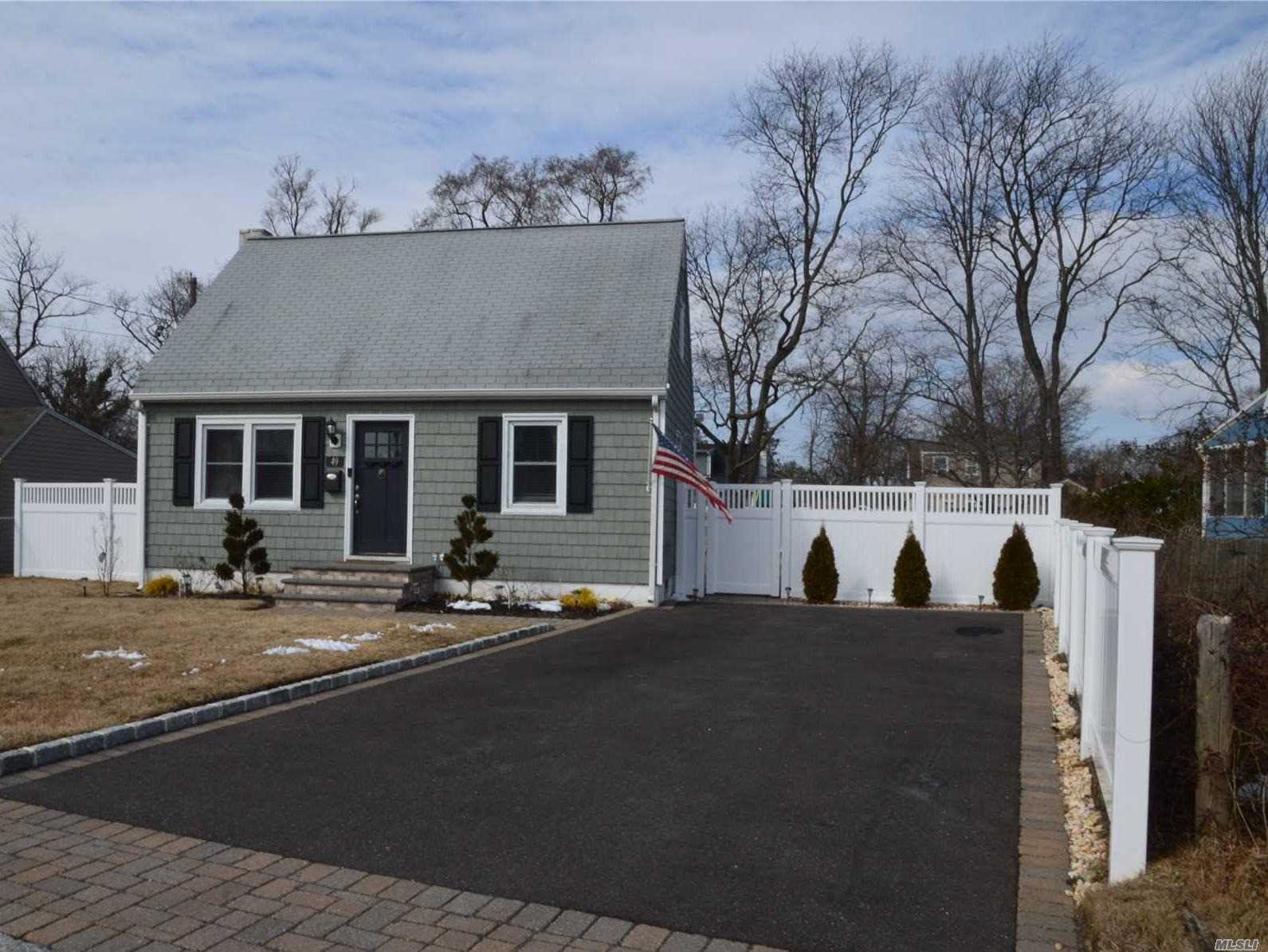 Cozy Cape, Master Br On 1st Floor,  Full Basement, 2 Bedrooms Upstairs, Hardwood Floors, Property 60X130 Park Like Grounds, New Side By Side 2 Car Driveway, New Walkway & Front Stoop, New Siding, New Wood Deck With Vinyl Railings, New Kitchen And Bathroom. Sliders Off Dining Area Onto The Deck Overlooking Large Fenced In Backyard.  Low Taxes