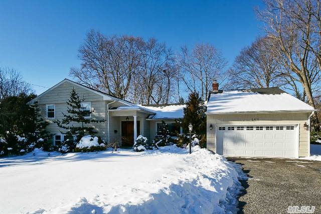 4 Br,  3.5 Bath Renovated Home With Open Floor Plan. Expanded State Of The Art Kitchen W/Sub-Zero,  & Viking App  Lr W/ Cathedral Ceiling & Fpl,  Fdr With French Doors Leading To Family Rm/Office & Mud Room. Lower Level Has 2nd Spacious Family Room With Built-Ins Great For Entertaining. Cac,  Hardwood Floors,  2 Car Garage. Low Taxes And Port Washington Schools. Alarm System