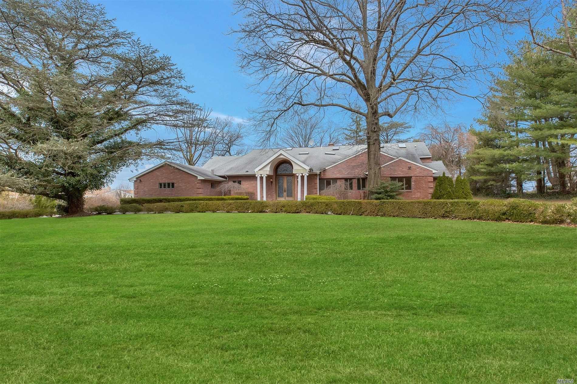 Gorgeous Brick Colonial Nestled in Prime Water view Street Of Kings Point. Offers Great Entertaining Rooms. Expansive views Of Long Island Sound From Many Rooms. This Home Features 8 Bedrooms, 5.5 Baths and finished basement. Best Deal In Kings Point Private Grace Harbour Pool Club it one of many extra features.