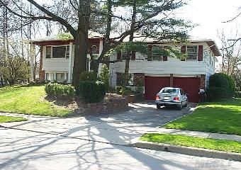 Perfectly Located On A Beautiful Tree-Lined Street. Large 4 Bedroom Hi-Ranch,  Oak Flooring Throughout,Large Family Room With Fpl,Deck, 2 Car Garage.  Just Listed!      