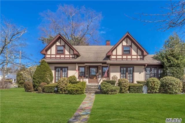 Bavarian Tudor Circa 1909 Living Room w/ Fireplace, Formal Dining Room, 2 Master Bedrooms Downstairs, Eik, 2 Full Baths, Sunroom, Upstairs has a Large family Room Flanked by 2 Bedrooms with dressing rooms Full Bathroom Gorgeous Floors, French Doors, Mouldings and Charm Bay Shore Schools