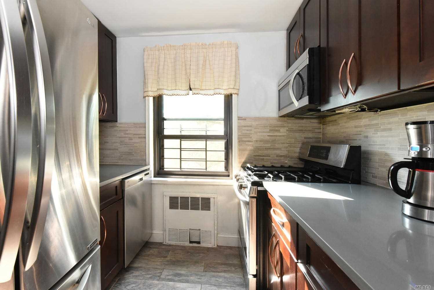 Renovated 1 bedroom apartment with hardwood floors, windowed kitchen and bathroom in the prestigious Eden Rock building. This pet friendly building features a doorman, laundry room, and a 24 hour gym. Conveniently located within minutes to buses, transportation, shopping, Briarwood Station, and the E and F trains. Maintenance $811.35