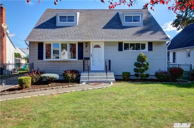 Fully Renovated Dormored Cape In The Heart Of Hicksville, Mid Block Property, Near School, Markets. Brand New Kitchen W/ Granite Counter Tops, Gas Cooking, Ss Appliances, Hardwood Floors, 4 Bedrooms 2 New Full Bath, New Roof, New Siding, New Windows, Full Finished Basement And Much More!