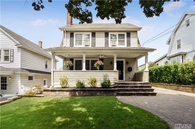 Classic Front Porch Colonial. Beautifully Paved Front Walk & Oversized Porch. Spacious Living Room W/ Wood Burning Fp, Large Renovated Open Kitchen, Dr, .5 Bath And Family Room With Sliding Doors To Private Flat Yard W/ Paved Patio. 2nd Fl Master, Lrg Renovated Bath, And 2 Additional Bedrooms.