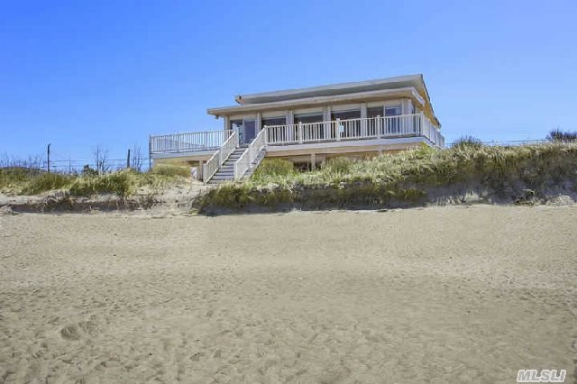 Sun,  Sand And Surf In Southold - Your Enchanting Beach House Awaits. With 100' Of White Sand On The Li Sound And Panoramic Views Of Ct. This Beach Front Home Features 3 Br,  2 Bath,  Sun Room And Wrap Around Deck Great For Entertaining Or Watching The Sunset. Close To All The North Fork Has To Offer....