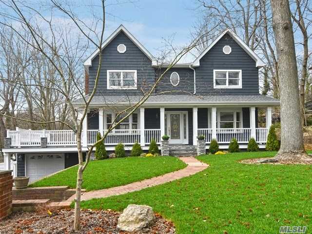 Classic Center Hall Colonial With Wrap Around Porch. Nestled In The Village Of Baxter Estates. Home Features, Large Chefs Kitchen Opening Into A Great Room, Hardwood Floors Throughout, New Moldings 4 Spectacular Bedrooms Including A Master Suite And Stunning Master En Suite. In Ground Pool, Architecturally Redesigned.