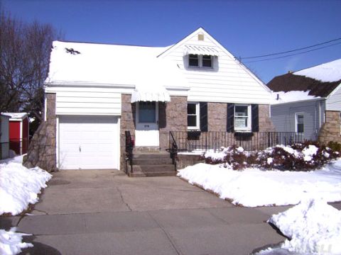 Beautiful Cape On Dead End Street, Features 3 Bedrooms, 1.5 Baths, Living Room, Kitchen, 1 Attached Garage And Full Finished Basement.