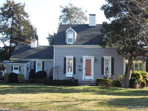 Lovely Unique Expanded Cape On Oversized Property. Fdr, Formal Lr W/Woodburning Fireplace. Kitchen W/Breakfast Nook & Butlers Pantry. Three Season Rm Overlooking Inground Pool. Partial Basement, Attached Garage. High & Dry - No Water From Sandy. New Roof (1st Layer), Windows & Siding. Beach Rights. Just Move In.