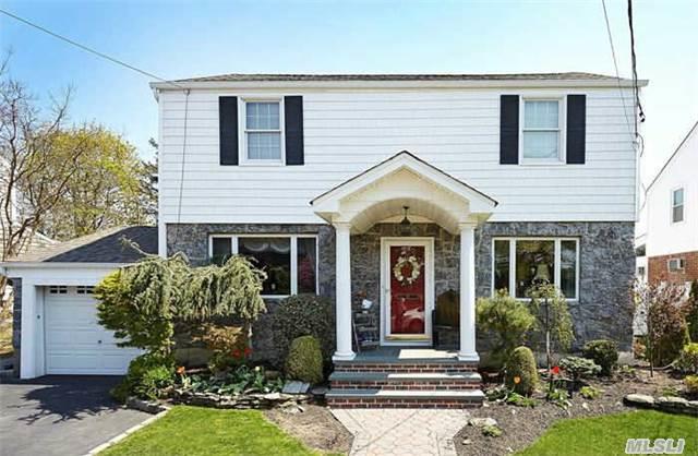 Stunning Four Bedroom Colonial Home With Newly Renovated Kitchen. This Mint Home Offers It All! Wood Floors Throughout With A Traditional Wood Burning Fireplace In The Living Room. The Master Suite Has A Siting Room And Private Bathroom. Enjoy The Beautiful Brick Patio Outside With Lush Greenery And The Central Air Inside - Full Finished Basement. Near All A Must See!